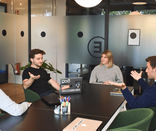 employees meeting discussion boardroom