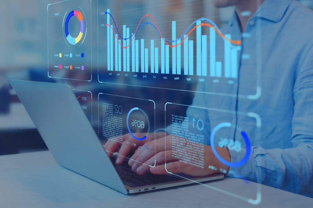 reporting and analytics virtual dashboard person on laptop with dashboards